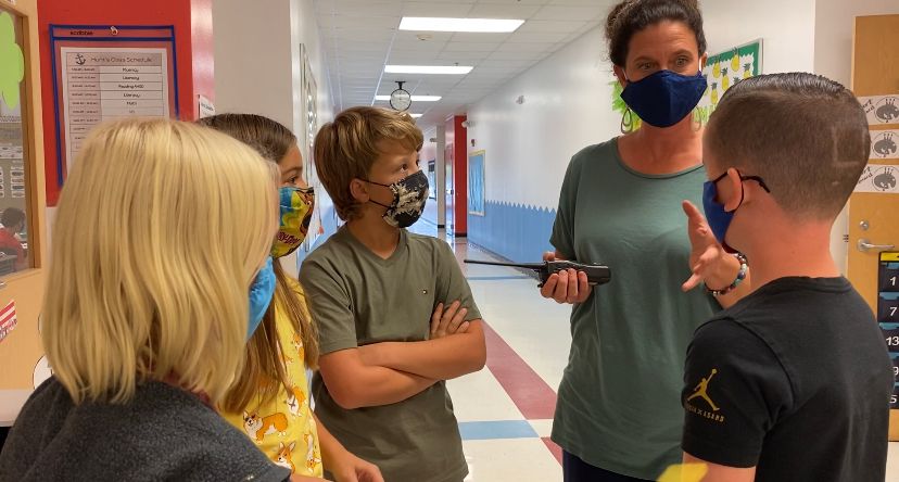 School counselor Anna Weddington works with students at Anderson Elementary. (Photo: Natalie Mooney)