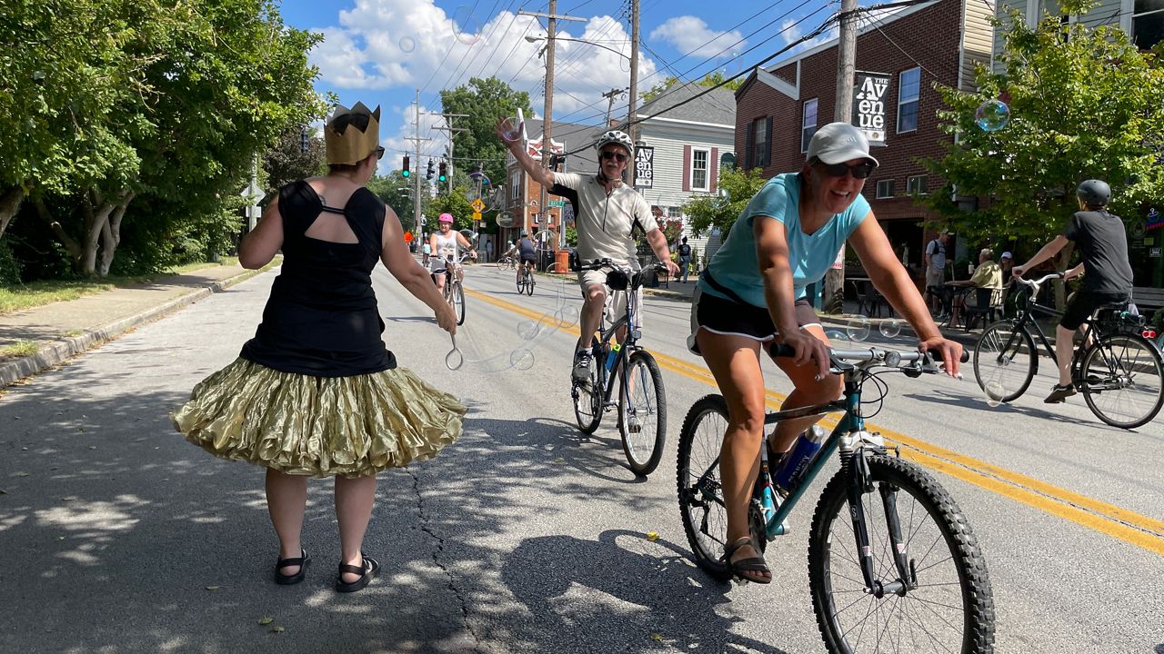 Cyclists ride down Frankfort Avenue during CycLouVia in 2022. (Spectrum News 1/Mason Brighton)