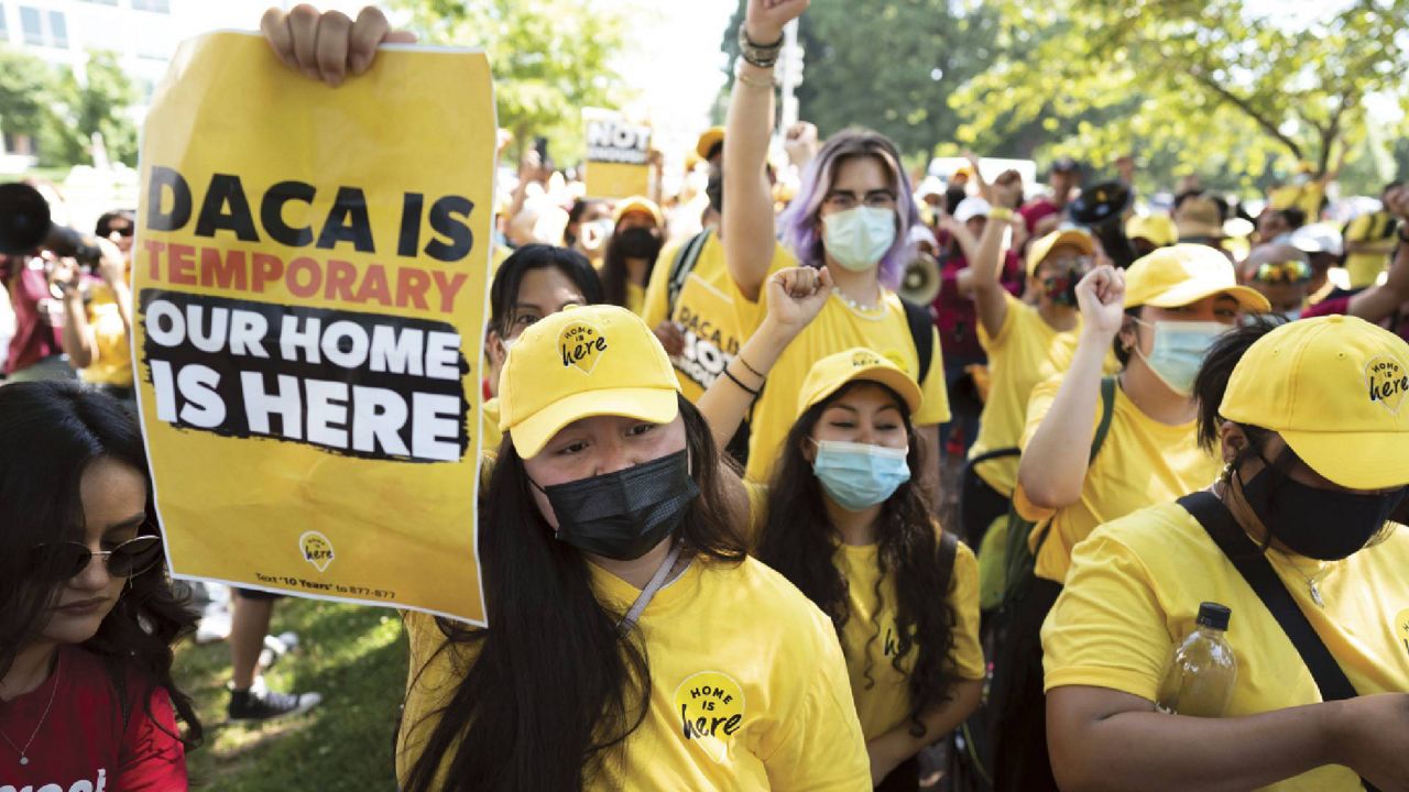 Susana Lujano, left, a dreamer from Mexico who lives in Houston, joins other activists to rally in support of the Deferred Action for Childhood Arrivals program, also known as DACA, at the Capitol in Washington, Wednesday, June 15, 2022. (AP Photo/J. Scott Applewhite)