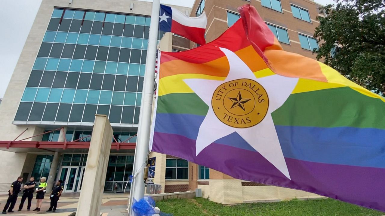 Pictured is the Dallas Pride Flag at Dallas Police Department headquarters. (Spectrum News 1/Lupe Zapata)