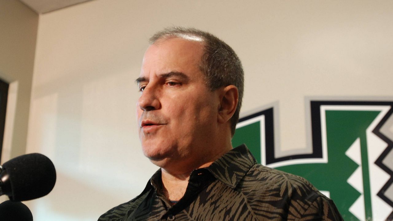 University of Hawaii athletic director David Matlin, seen at a press conference in 2014, spoke to media and offered a general apology Tuesday for how the Hawaii football coaching search played out. 