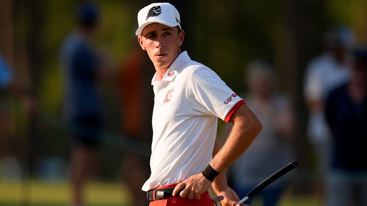 David Puig of Spain reacts after missing a putt on the 16th hole during the second round of the U.S. Open golf tournament Friday, June 14, 2024, in Pinehurst, N.C. (AP Photo/Mike Stewart)