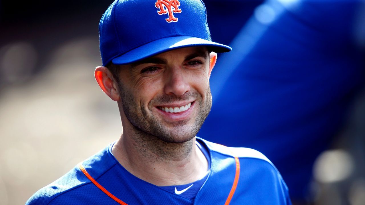 In this Sept. 30, 2018, file photo, New York Mets' David Wright returns to the dugout after an on-field ceremony during a baseball game against the Miami Marlins in New York. (AP Photo/Jason DeCrow, File)