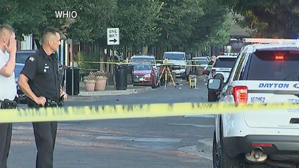 Authorities work the scene of a mass shooting, Sunday, Aug. 4, 2019, in Dayton, Ohio. A several people in Ohio have been killed in the second mass shooting in the U.S. in less than 24 hours, and the suspected shooter is also deceased, police said. (AP Photo/John Minchillo)