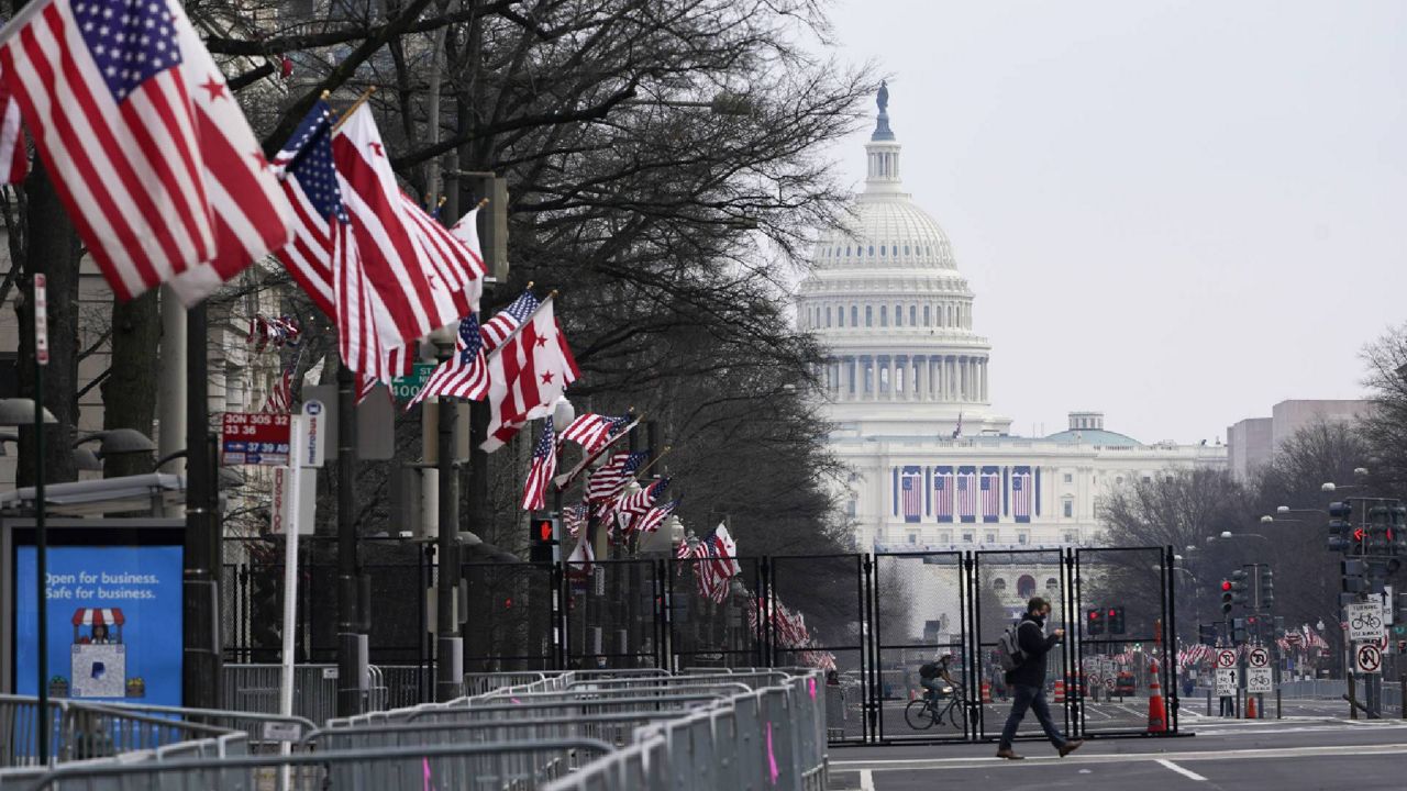 A view down Pennsylvania Avenue shows the security around the Capitol Hill in Washington, Friday, Jan. 15, 2021, ahead of the inauguration of President-elect Joe Biden and Vice President-elect Kamala Harris. (AP Photo/Susan Walsh)