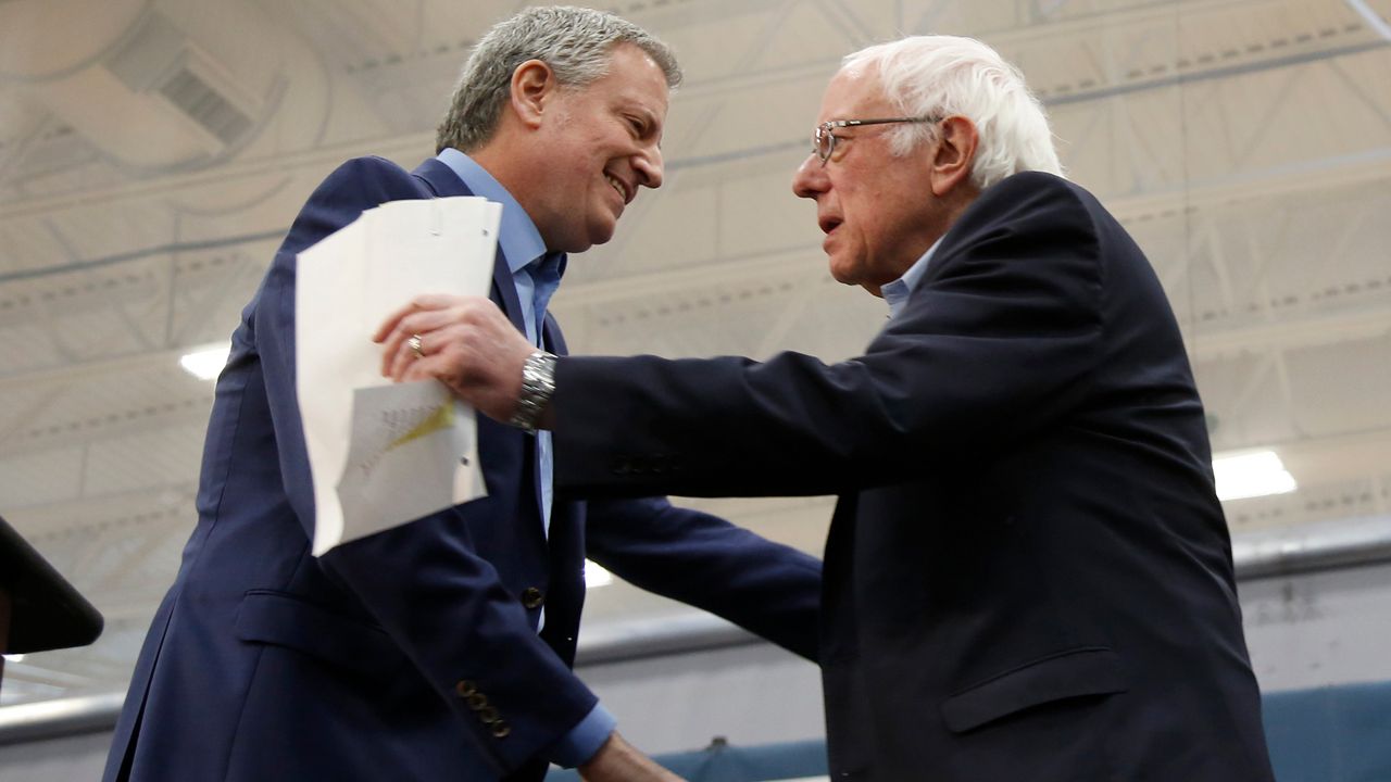 Bill de Blasio and Bernie Sanders