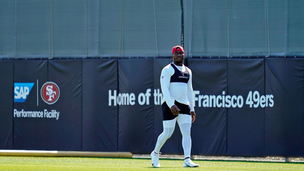 San Francisco 49ers wide receiver Deebo Samuel walks across a field during NFL football training camp in Santa Clara, Calif., Wednesday, July 27, 2022. (AP Photo/Godofredo A. Vásquez)