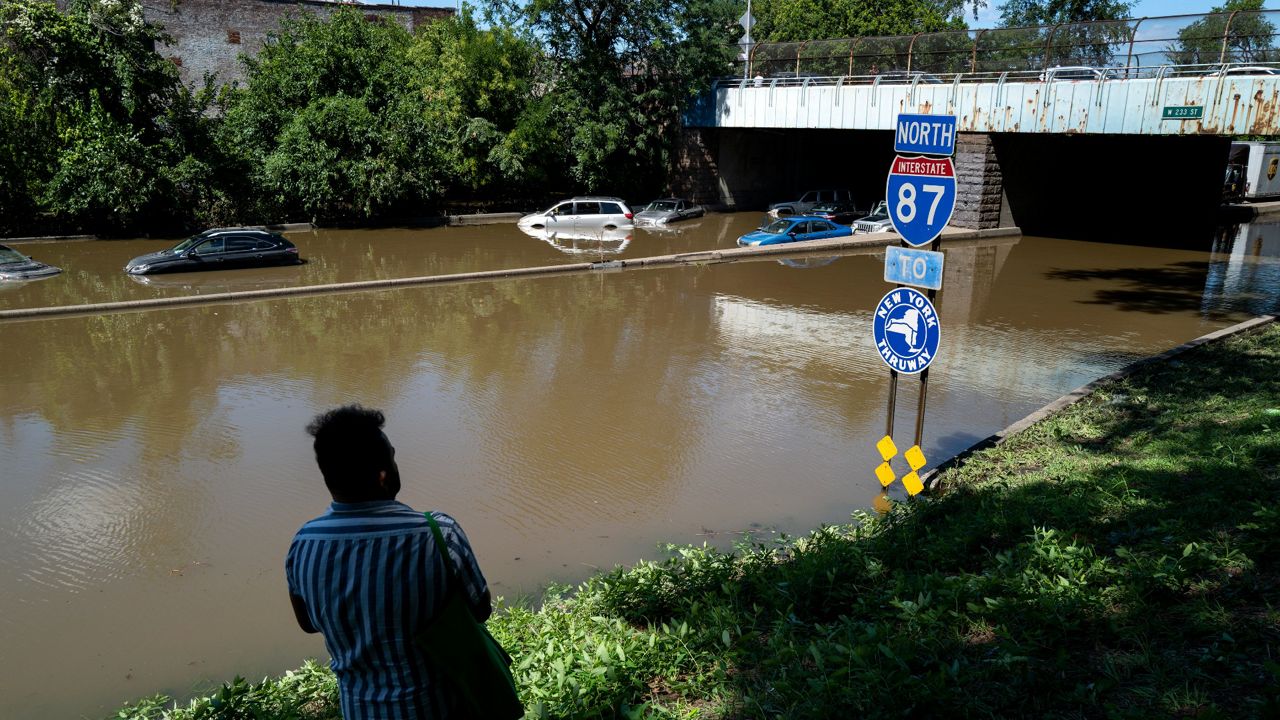 In September, the Major Deegan in the Bronx flooded with excess storm water during Hurricane Ida. A plan to raise the historic Tibbetts Brook above ground, and run parallel to the highway, would redirect that water into the Harlem River. (AP Photo/Craig Ruttle)