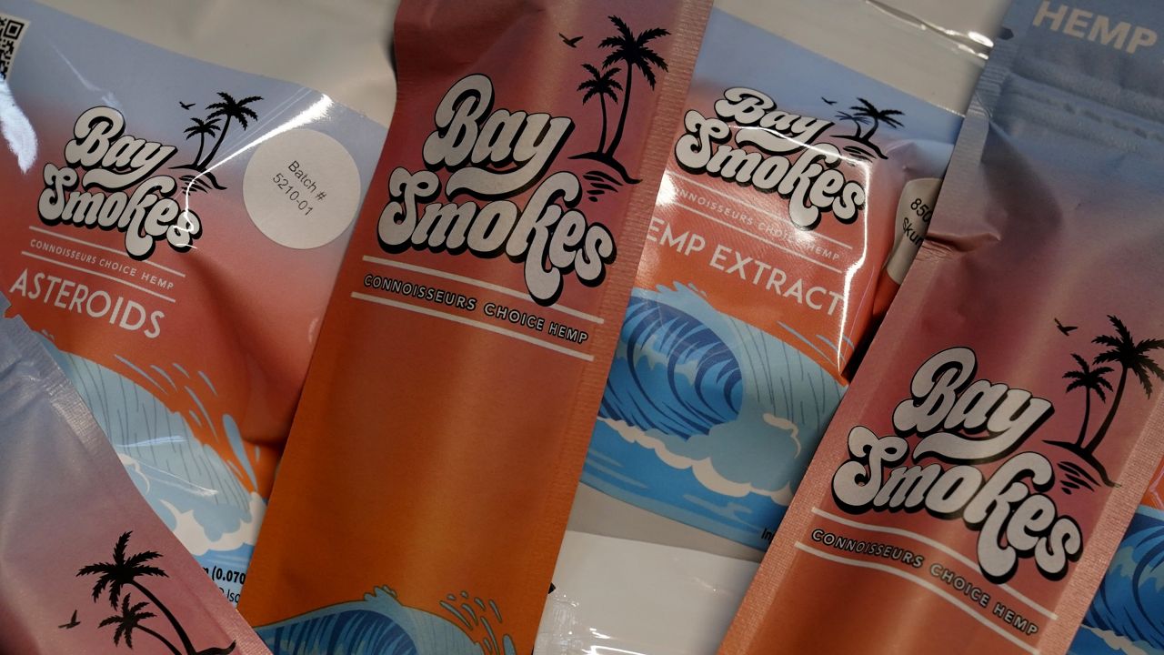 A small selection of products offered by William Goodall, and Katiana Kay, his partner in their CBD online shop Bay Smokes, are shown, Thursday, July 22, 2021, in Sunny Isles Beach, Fla. (AP Photo/Wilfredo Lee)
