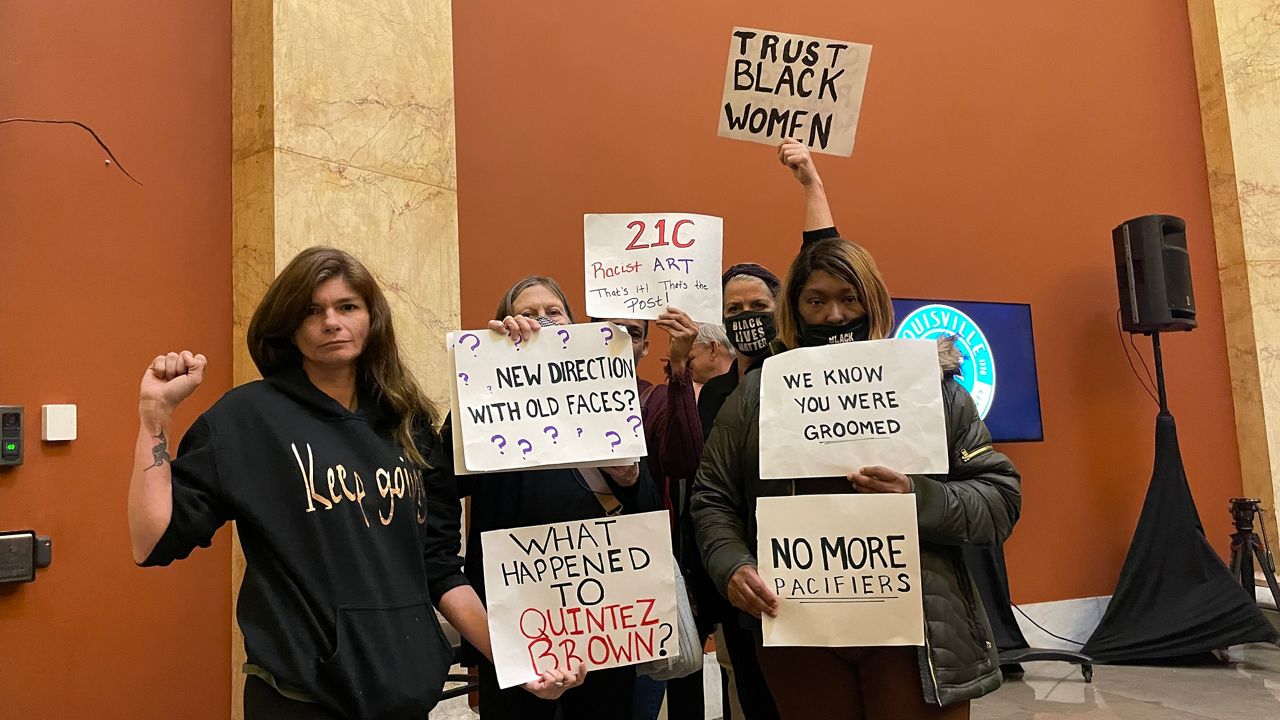 Demonstrators at Metro Hall during Craig Greenberg's open house. (Spectrum News 1/Mason Brighton)