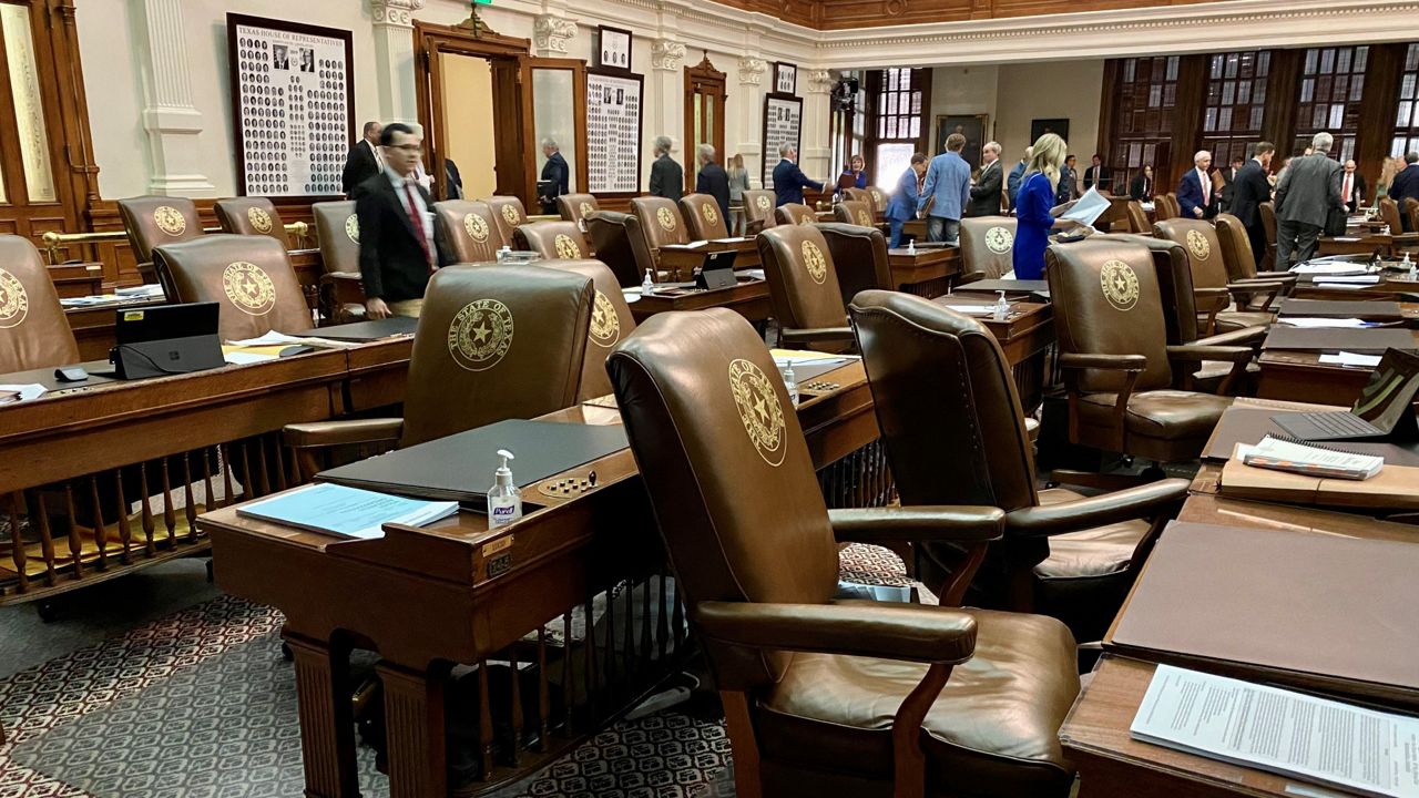 Desks normally occupied by Democrats in the Texas House are empty following a May 30, 2021, walkout designed to prevent a vote on the controversial Senate Bill 7. (Spectrum News 1/Reena Diamante)