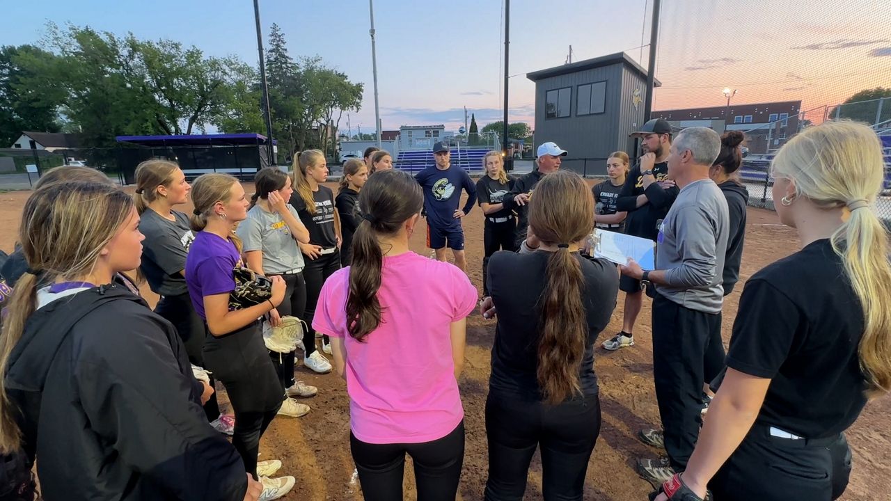 Denmark softball team huddling up