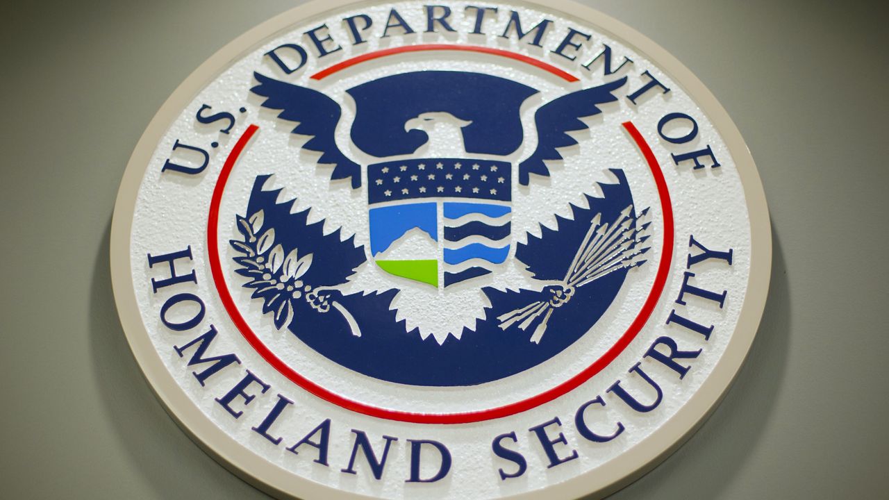 The Department of Homeland Security logo is seen during a news conference in Washington, Feb. 25, 2015. (AP Photo/Pablo Martinez Monsivais, File)