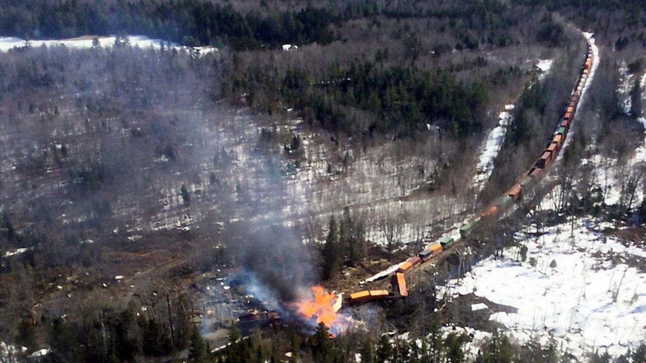 Several locomotives and rail cars burn after a freight train derailed Saturday, April 15, in Sandwich Academy Grant Township, near Rockwood. Three workers were treated and released from a hospital, and Canadian Pacific Railway will be leading the cleanup and track repair, according to officials. (Maine Forest Service via AP)