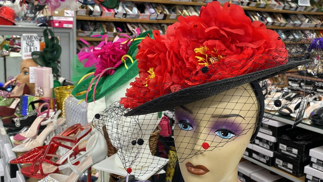 Hats, dresses and patterns adorn Churchill Downs for Derby - Louisville  Business First