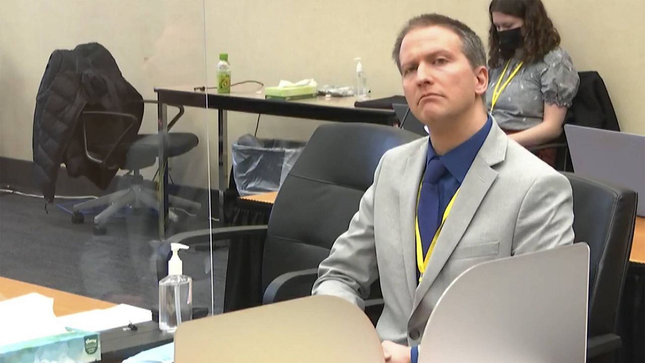 Derek Chauvin listens as his defense attorney, Eric Nelson, gives closing arguments Monday. (Court TV via AP, Pool) 