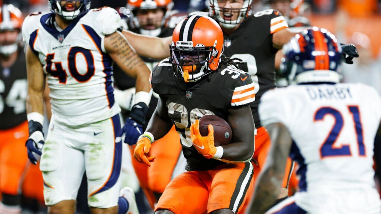 Cleveland Browns running back D'Ernest Johnson (30) plays against the Denver Broncos during the second half of an NFL football game, Thursday, Oct. 21, 2021, in Cleveland. (AP Photo/Ron Schwane)