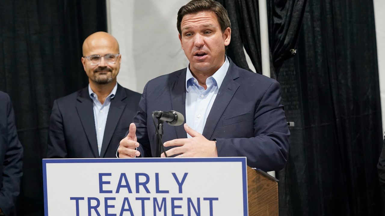Florida Governor Ron DeSantis speaks at the opening of a monoclonal antibody site Wednesday, Aug. 18, 2021, in Pembroke Pines, Fla. The site at C. B. Smith Park will offer monoclonal antibody treatment sold by Regeneron to people who have tested positive for COVID-19. (AP/Marta Lavandier)