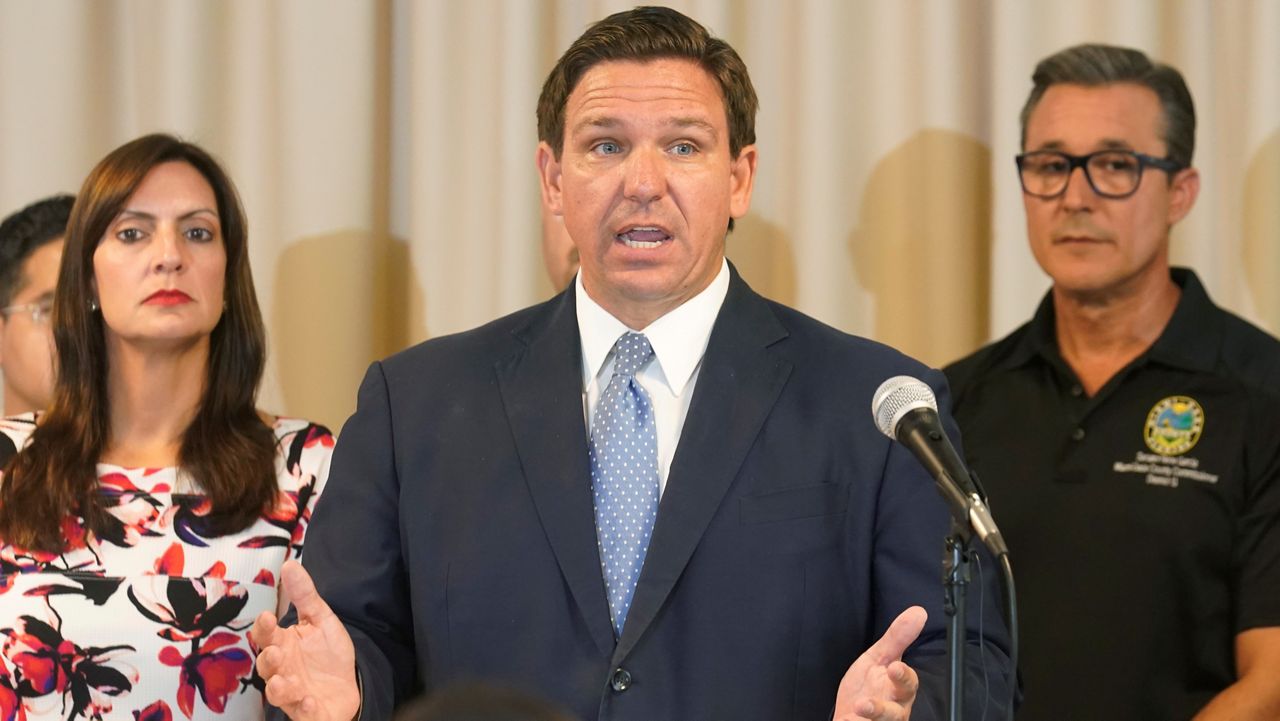 Florida Governor Ron DeSantis answers questions related to school openings and the wearing of masks in Surfside, Fla. (AP/Marta Lavandier)