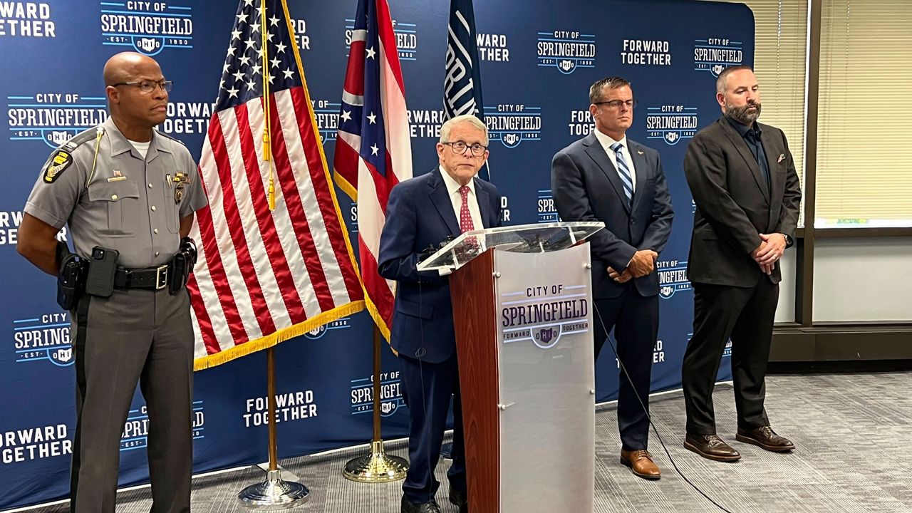 Ohio Gov. Mike DeWine (R) speaks at a press conference at Springfield City Hall alongside Ohio State Highway Patrol Col. Charles Jones, left, Director of the Department of Public Safety Andy Wilson, second from right, and Springfield City School Superintendent Robert Hill, right, in Springfield, Ohio, Monday, Sept. 16, 2024. (AP Photo/Patrick Aftoora-Orsagos)