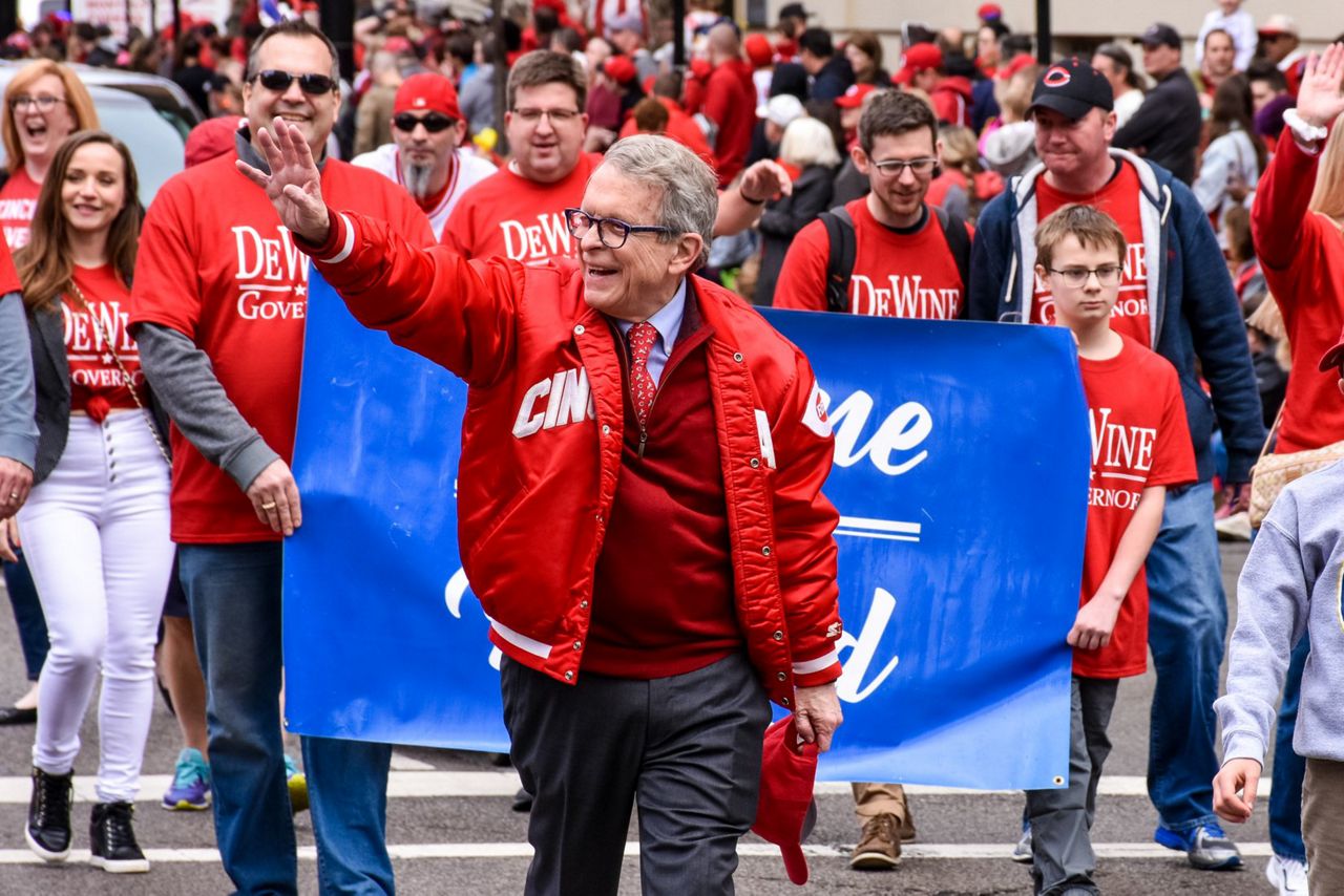 Gov. Mike DeWine and his group are among roughly 160 entries in the 2023 Findlay Market Opening Day Parade. (Casey Weldon/Spectrum News 1)
