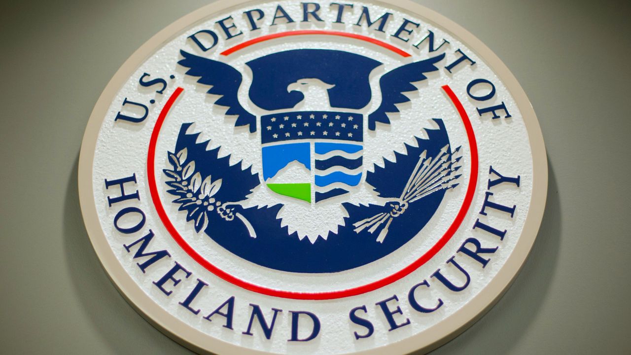 The Department of Homeland Security logo is seen during a news conference. (AP Photo/Pablo Martinez Monsivais, File)