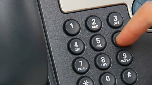 https://s7d2.scene7.com/is/image/TWCNews/dialing-a-telephone-filejpg