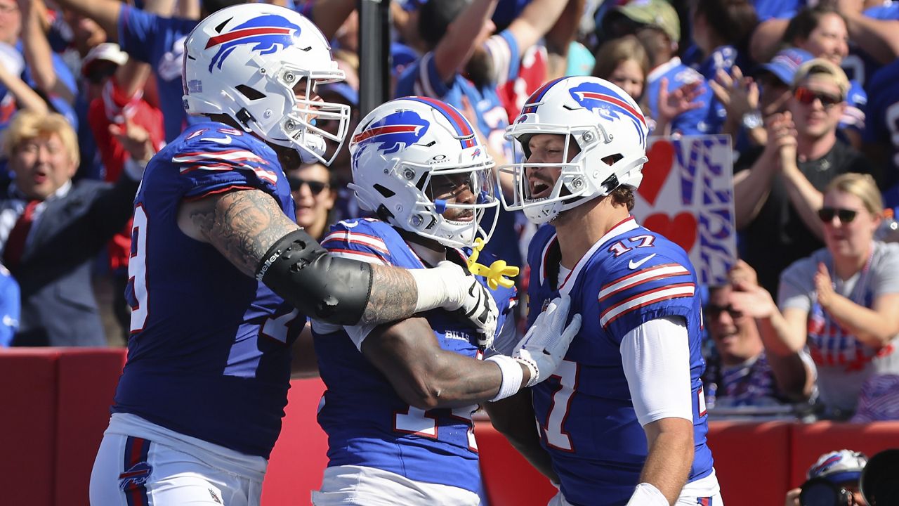 Josh Allen throws 4 TD passes, runs for score, Bills rout division