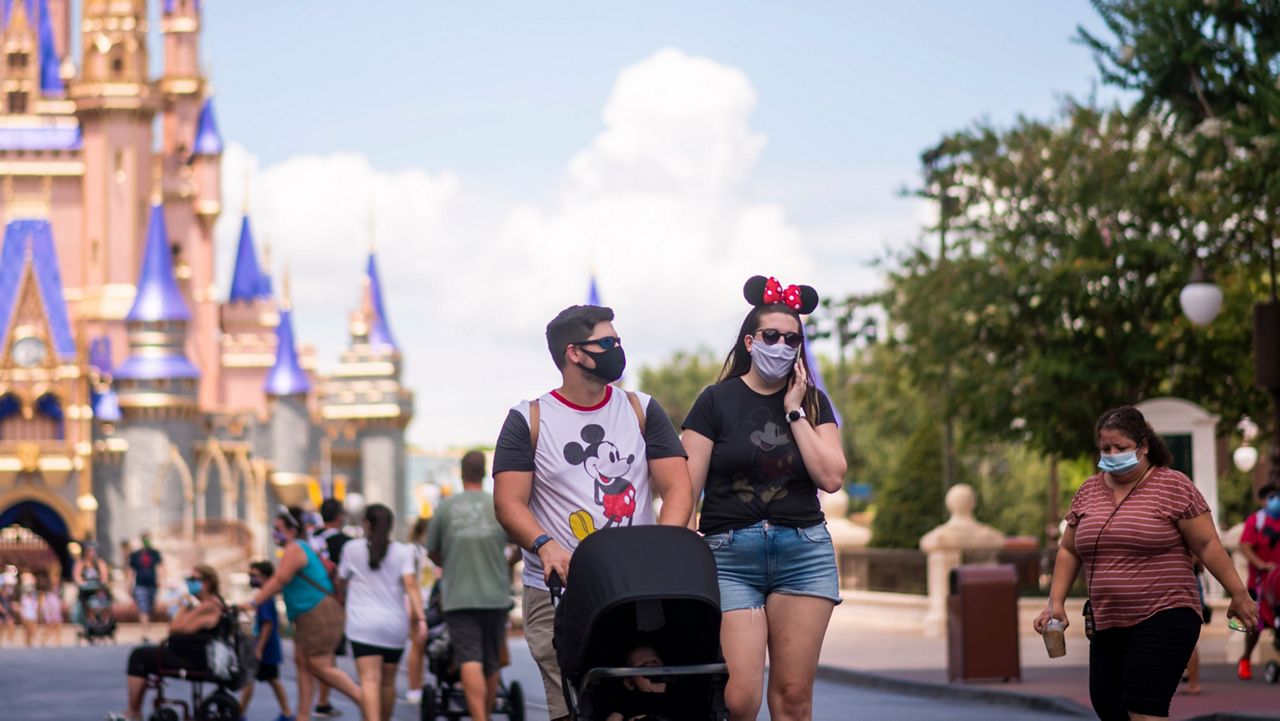 Disney World, starting June 15, will make face masks optional for fully vaccinated guests in most areas. (AP/Charles Sykes/Invision)