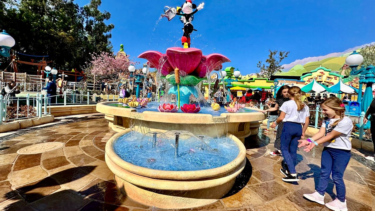 Children play with the new water fountain inside Toontown in Disneyland. (Spectrum News/Joseph Pimentel)