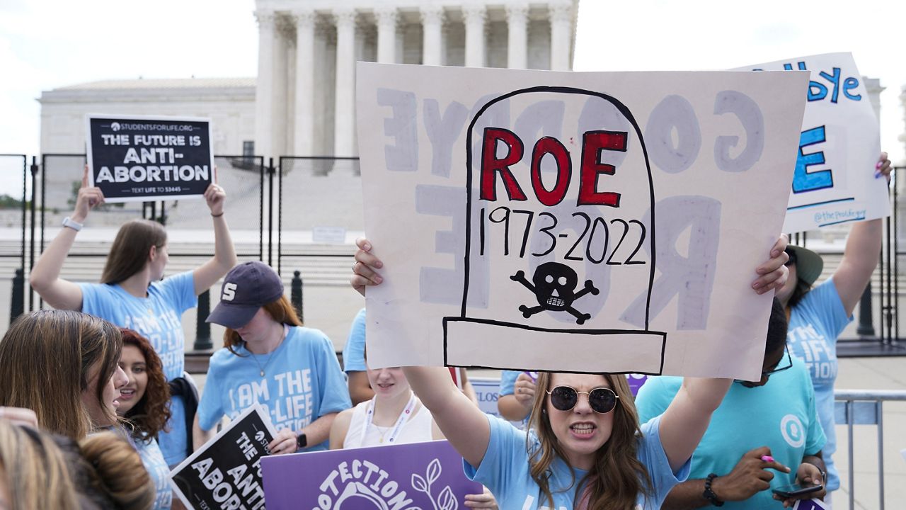 Demonstrators protest about abortion outside the Supreme Court in Washington, June 24, 2022. (AP Photo/Jacquelyn Martin, File)