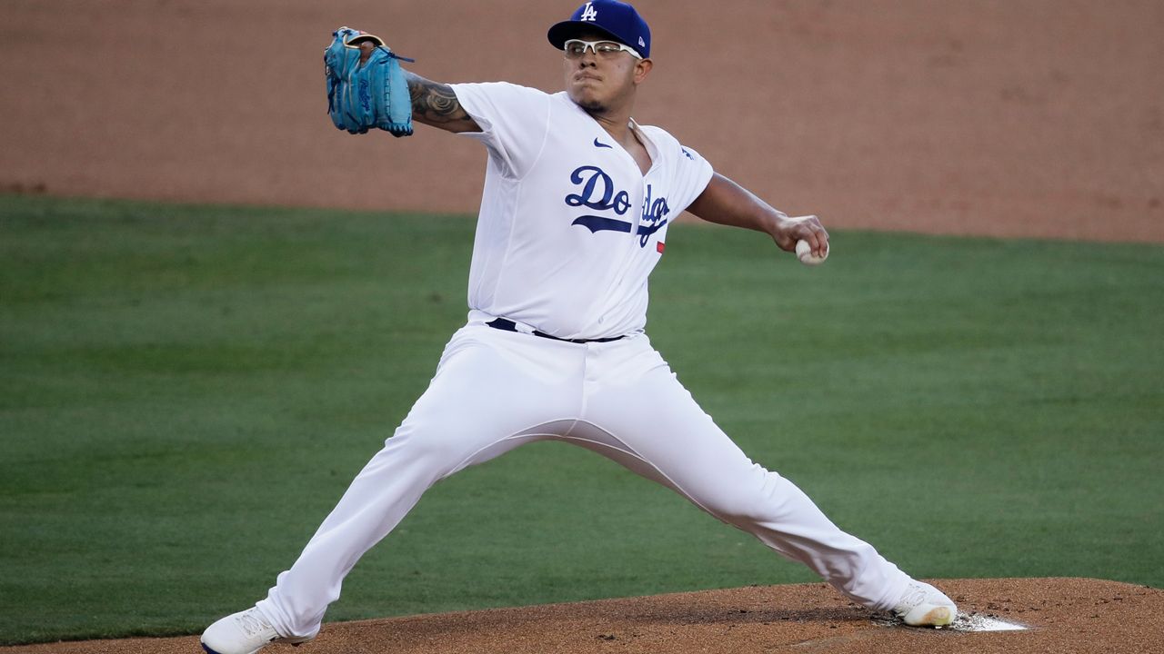 Los Angeles Dodgers starting pitcher Julio Urias throws to a San Francisco Giants batter during the first inning of a baseball game Sunday, July 26, 2020, in Los Angeles. (AP Photo/Jae C. Hong)