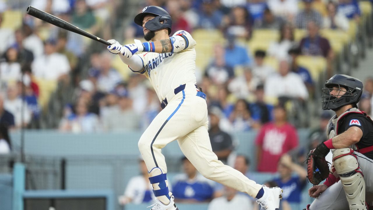 Los Angeles Dodgers left fielder Andy Pages (44) swings during a baseball game against the Cleveland Guardians in Los Angeles, Saturday, Sept. 7, 2024. (AP Photo/Ashley Landis)