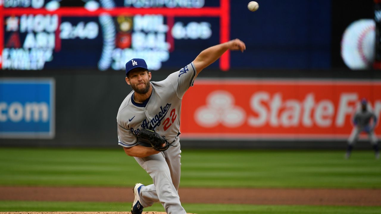 Los Angeles Dodgers pitcher Clayton Kershaw throws against the Minnesota Twins during the first inning of a baseball game Wednesday in Minneapolis. (AP Photo/Craig Lassig)