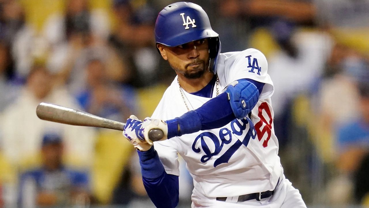 Los Angeles Dodgers' Mookie Betts bats during a baseball game against the Milwaukee Brewers Friday, Oct. 1, 2021, in Los Angeles. (AP Photo/Ashley Landis, File)