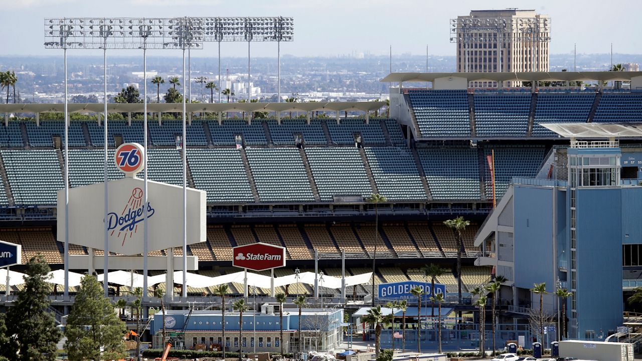 This March 25, 2020, file photo shows the exterior of Dodgers Stadium, home of the Los Angeles Dodgers baseball team, in Los Angeles. (AP Photo/Marcio Jose Sanchez, File)