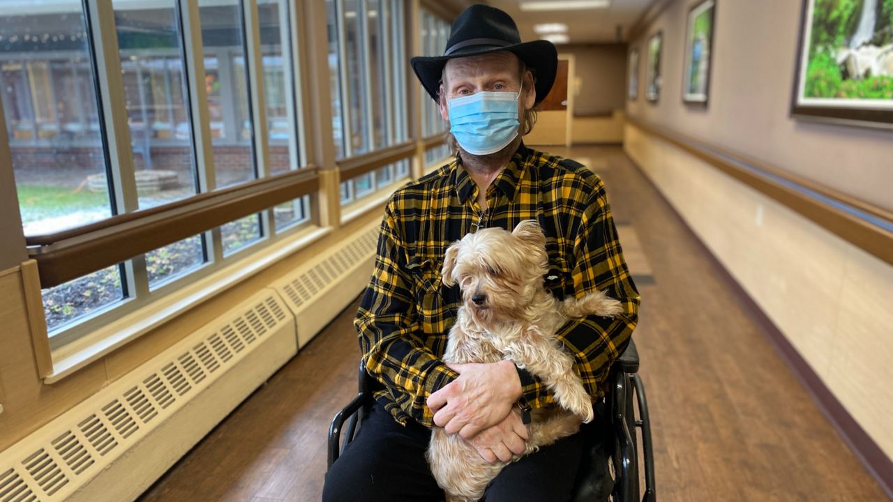 CNY nurse adopts patient's dog to keep them connected
