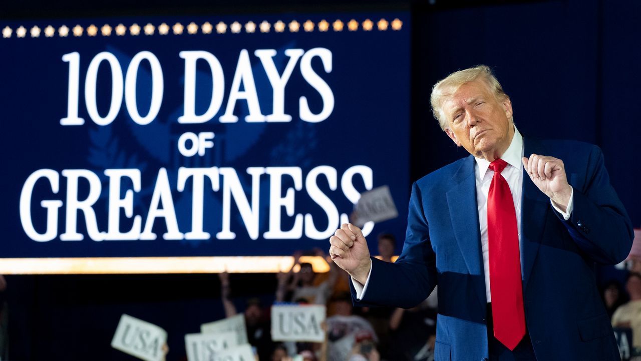President Donald Trump arrives to speak on his first 100 days at Macomb County Community College Sports Expo Center, Tuesday, April 29, 2025, in Warren, Mich. (AP Photo/Alex Brandon)