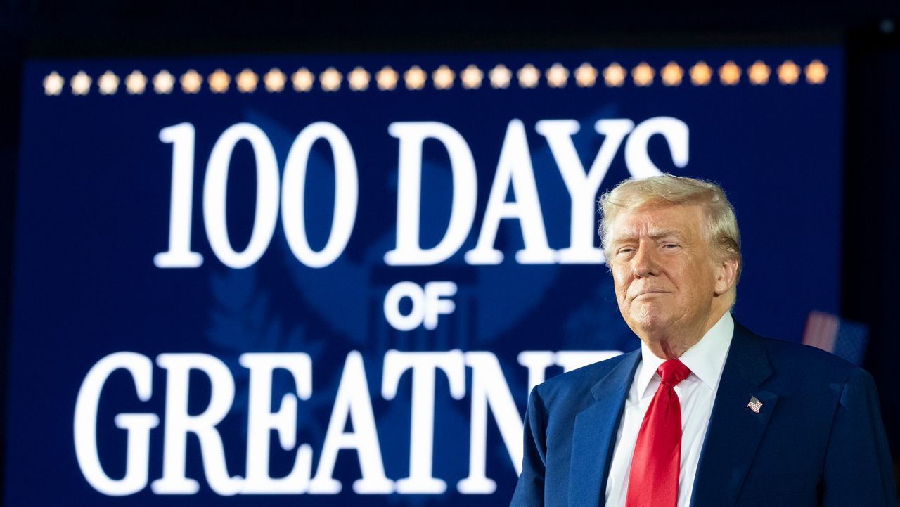 President Donald Trump arrives to speak on his first 100 days at Macomb County Community College Sports Expo Center, Tuesday, April 29, 2025, in Warren, Mich. (AP Photo/Alex Brandon)