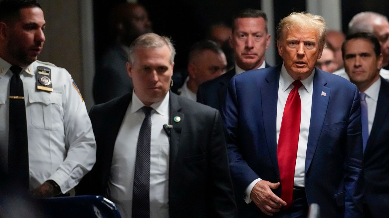 Former President Donald Trump leaves Manhattan criminal court, Thursday, Feb. 15, 2024, in New York. (AP Photo/Mary Altaffer)