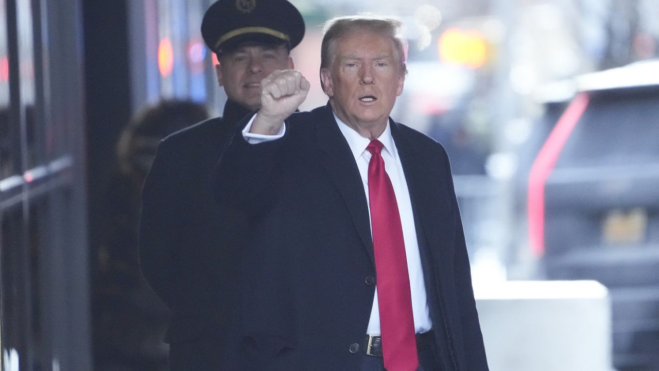 Former President Donald Trump leaves his apartment building in New York, Wednesday, Jan. 17, 2024.  (AP Photo/Seth Wenig)