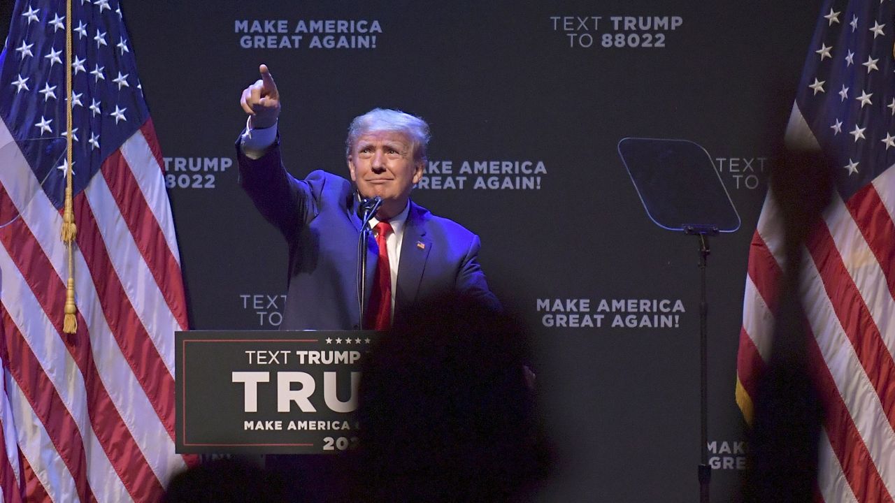 Former President Donald Trump speaks at a campaign event on Monday, March 13, 2023 in Davenport, Iowa.