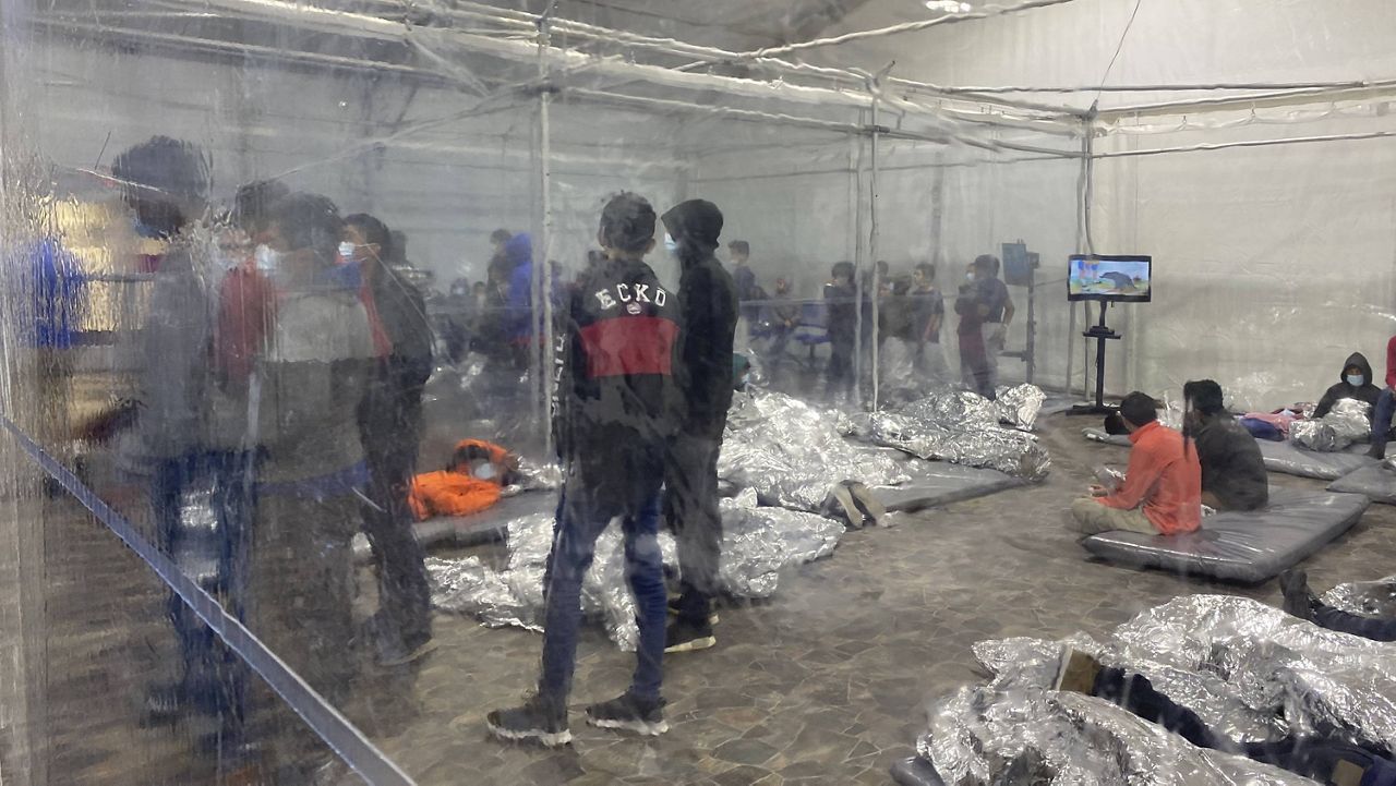 This March 20 photo shows detainees in a Customs and Border Protection temporary overflow facility in Donna, Texas. (Photo courtesy of the Office of Congressman Henry Cuellar via AP)