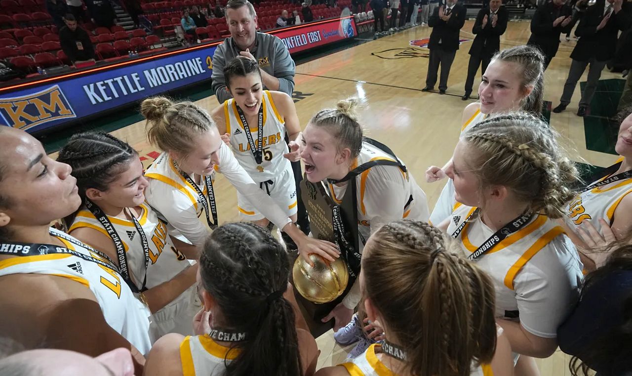 Kettle Moraine celebrates their victory after their WIAA Division 1 championship game Saturday, March 11, 2023 at the Resch Center in Ashwaubenon, Wis. Kettle Moraine beat Brookfield East 47-40. (Mark Hoffman/Milwaukee Journal Sentinel)
