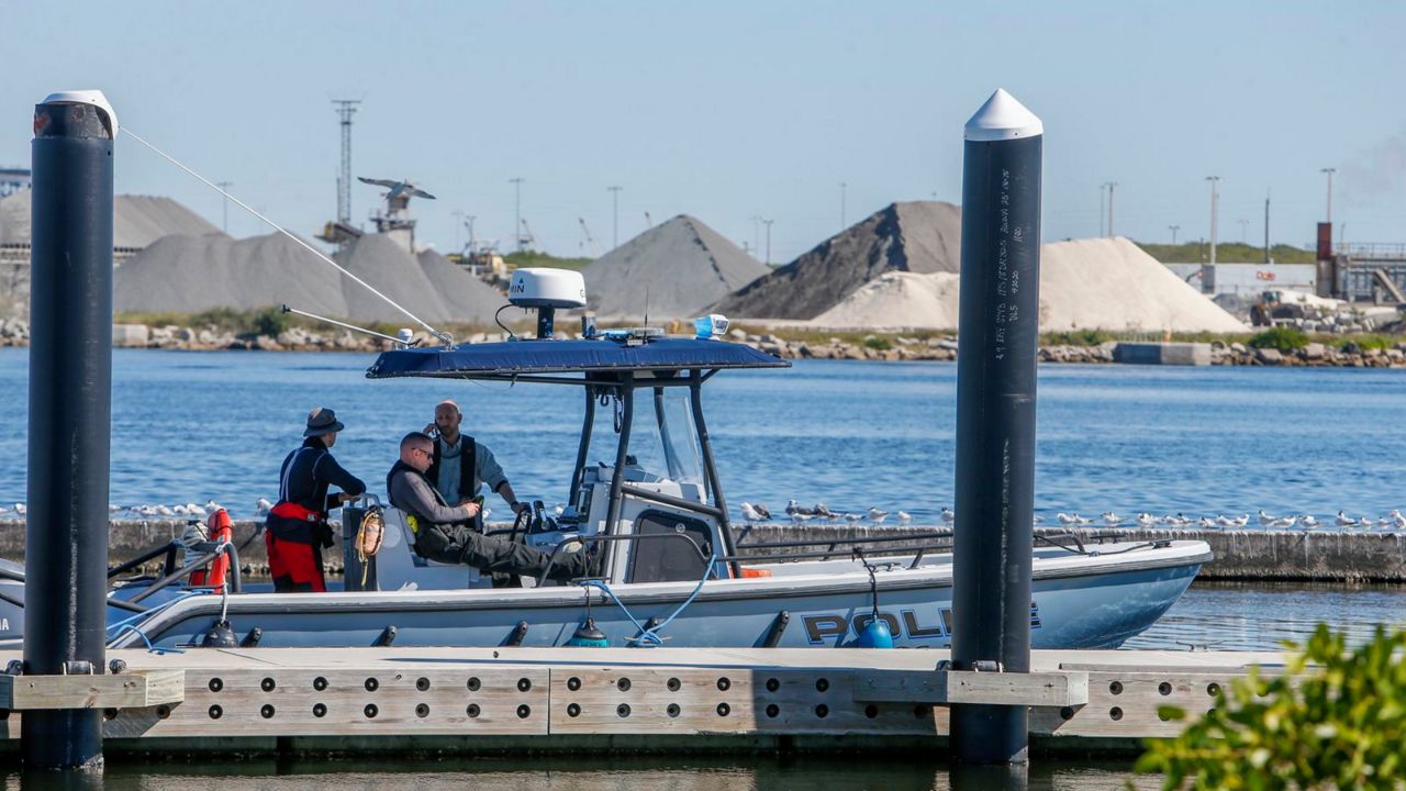 A police boat is seen close to where the plane crashed in the bay near Peter O. Knight Airport on Monday. (Tampa Bay Times/Ivy Ceballo)