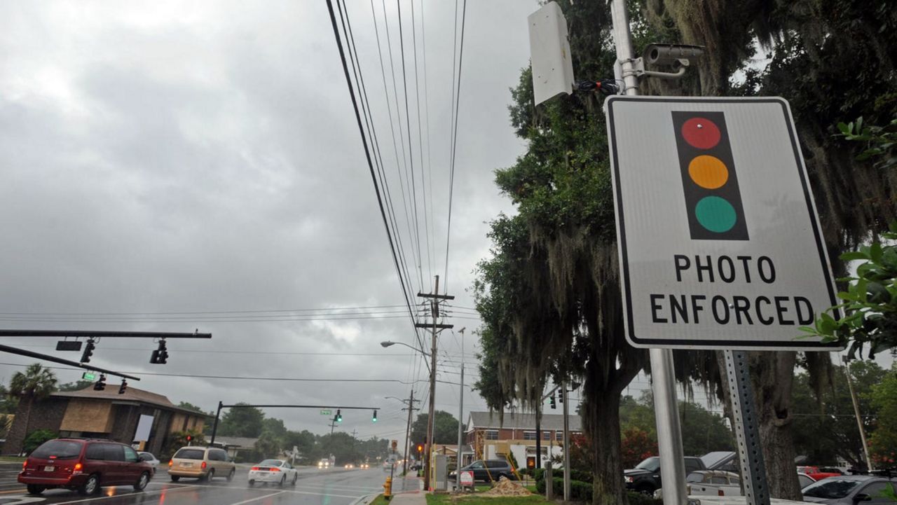 A red light camera is installed at the corner of Beacon Rd. and South Florida Ave. City commissioners voted unanimously to accept state funding to help grow Lakeland's Intersection Collision Avoidance Safety Program, or iCASP, from four to up to 25 intersections by June 2023. (The Ledger)