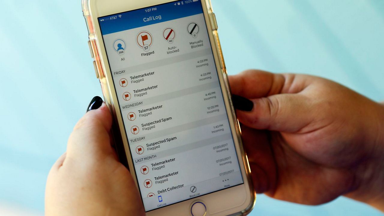 A new Florida law may help ward off unwanted texts and calls from telemarketers. (AP/John Raoux)