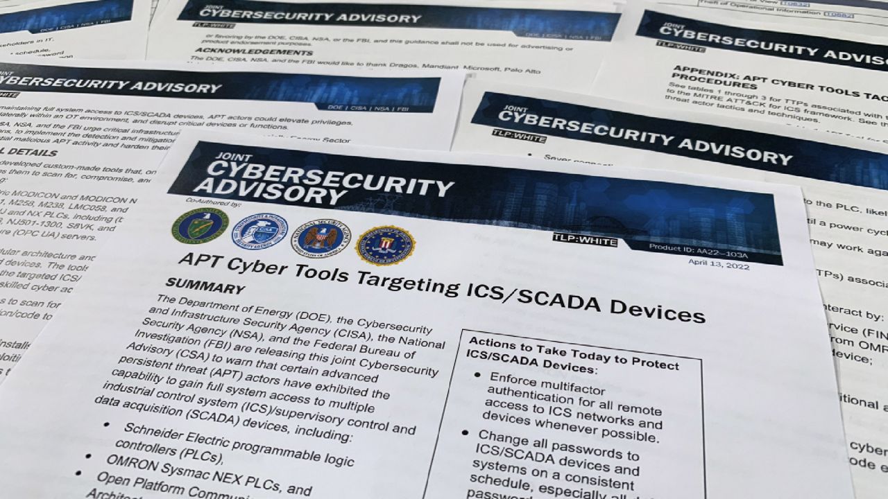 A joint cybersecurity advisory released by federal authorities is photographed in Washington, Wednesday, April 13, 2022. Agencies issued the joint alert Wednesday announcing the discovery of malicious cyber tools capable of gaining "full system access" to multiple industrial control systems. (AP Photo/Jon Elswick)
