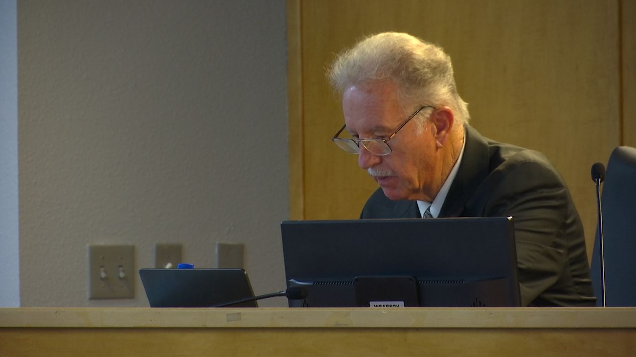 Brevard Public Schools Interim Superintendent Dr. Robert Schiller listens to part of the Board Work Session on March 28, 2023. During the regular board meeting that night, the board voted unanimously to put him on paid administrative leave, effective immediately. (Spectrum News/Will Robinson-Smith) 