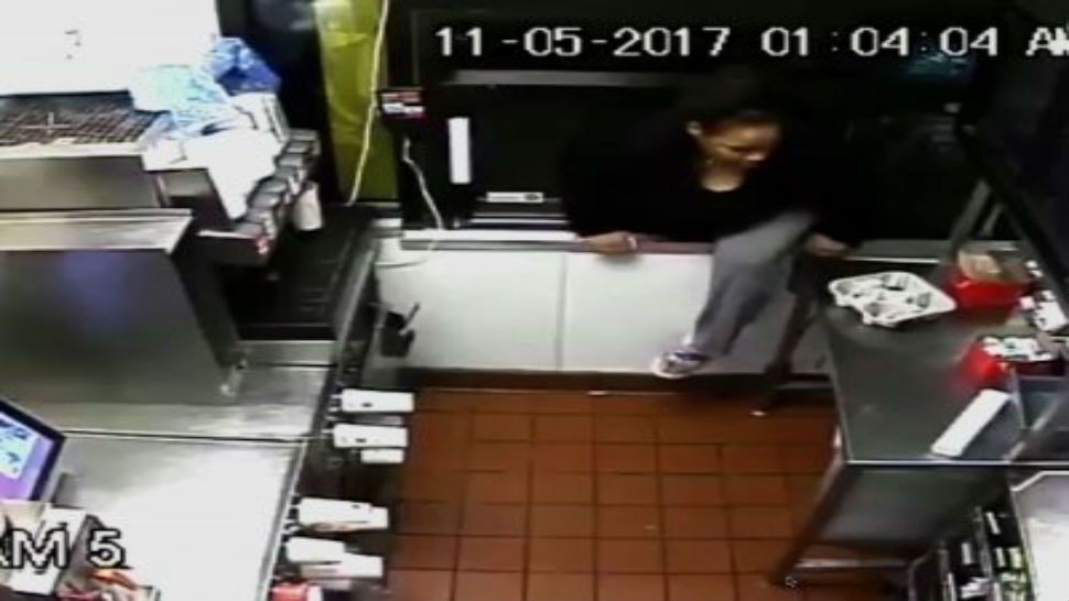 Police are asking for help finding a woman they say helped herself to free food, drinks and cash at a Maryland McDonald's. Surveillance footage shows a woman climbing through a drive-thru window, before allegedly burglarizing the store. (Courtesy: Associated Press)